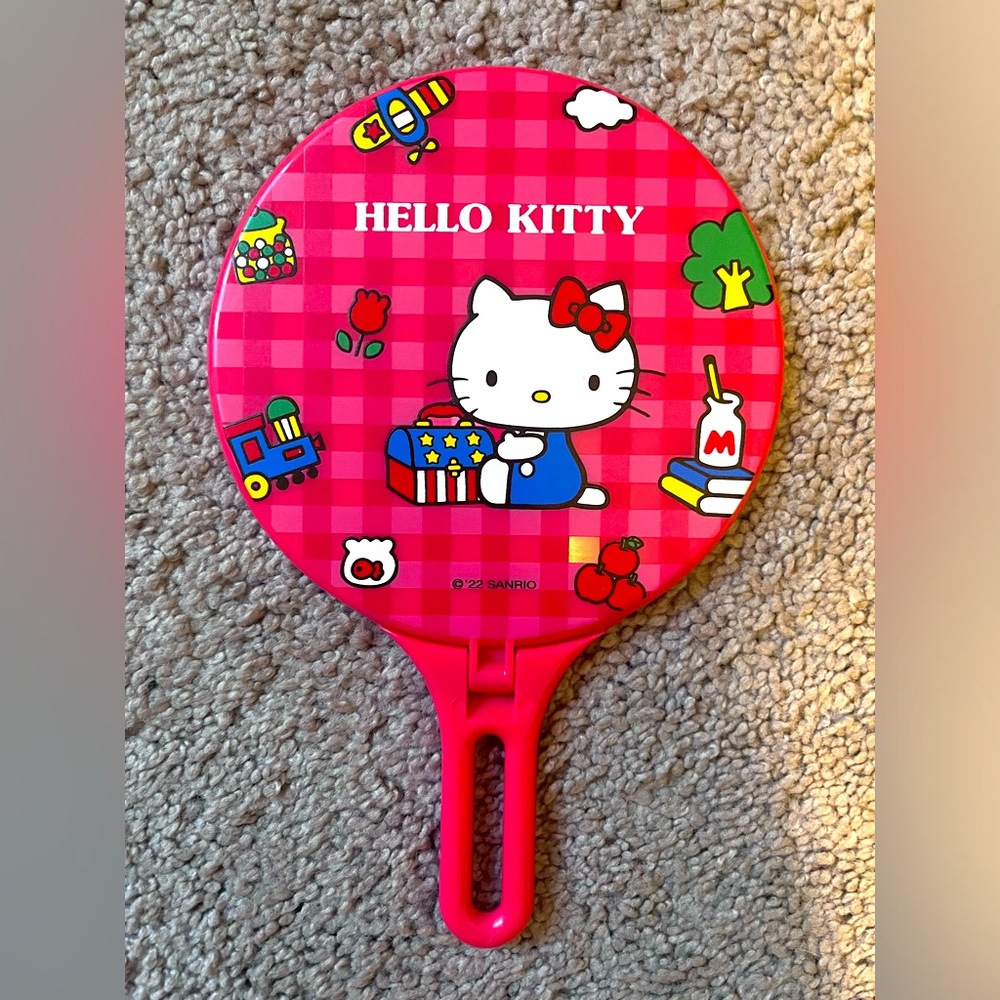 Hello Kitty hand held and table top mirror - red with Hello Kitty motif